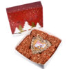 Erdnuss-Nuggets für Vögel und ein Herz aus Moral in einer Weihnachtsgeschenkbox verpackt.