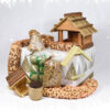 Kerstpakket met voederhuis voor vogels en vogelvoer.