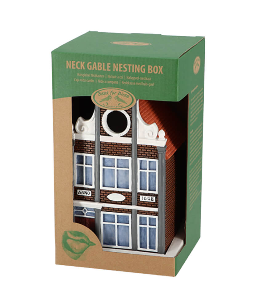 Lustiges Vogelhaus als Geschenk in einer Schachtel.